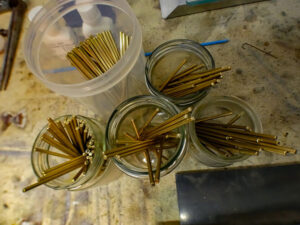 rods inside of glass jars